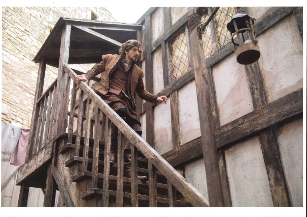 man-running-downstairs-in-location-shoot